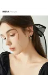 Black heart-shaped earrings, 2023 new style, elegant ear clips, niche design earrings, high-end ear studs -0101 Jia Liang Accessories Application Scenario